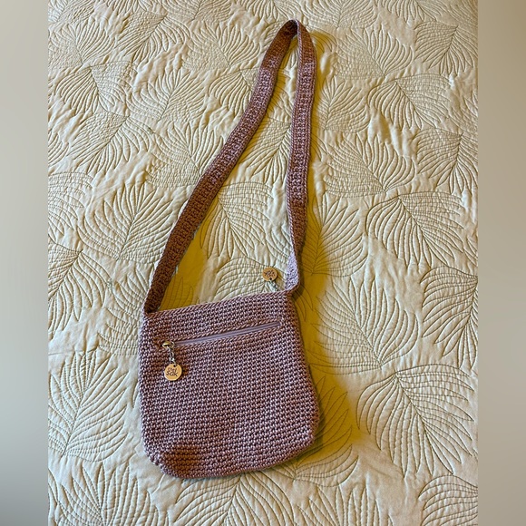 The Sak Handbags - The Sak crocheted taupe colored cross body purse. Silver charms and zipper.